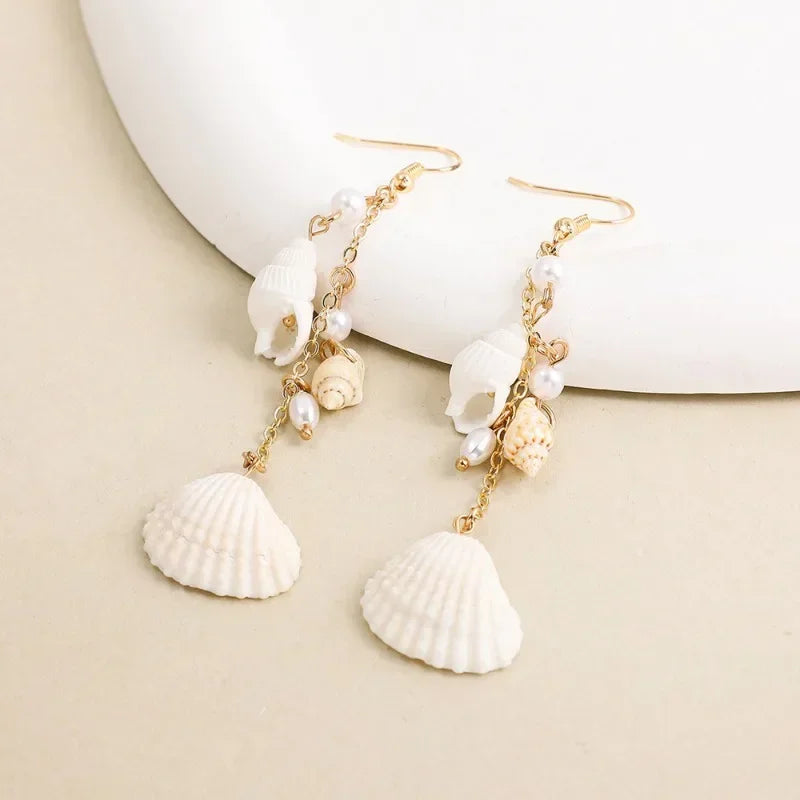 Boucles d'oreilles conque en métal doré, style bohème.