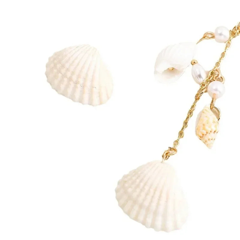 Boucles d'oreilles conque en métal doré, style bohème.