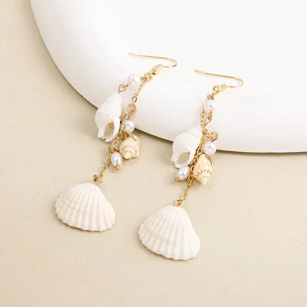 Boucles d'oreilles conque en métal doré, style bohème.