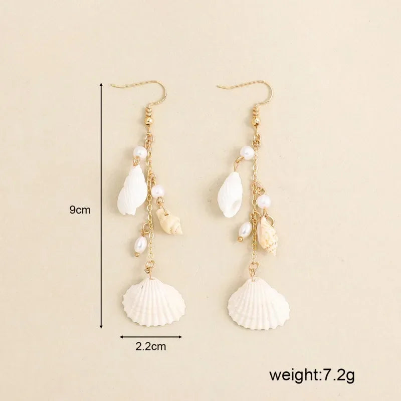 Boucles d'oreilles conque en métal doré, style bohème.