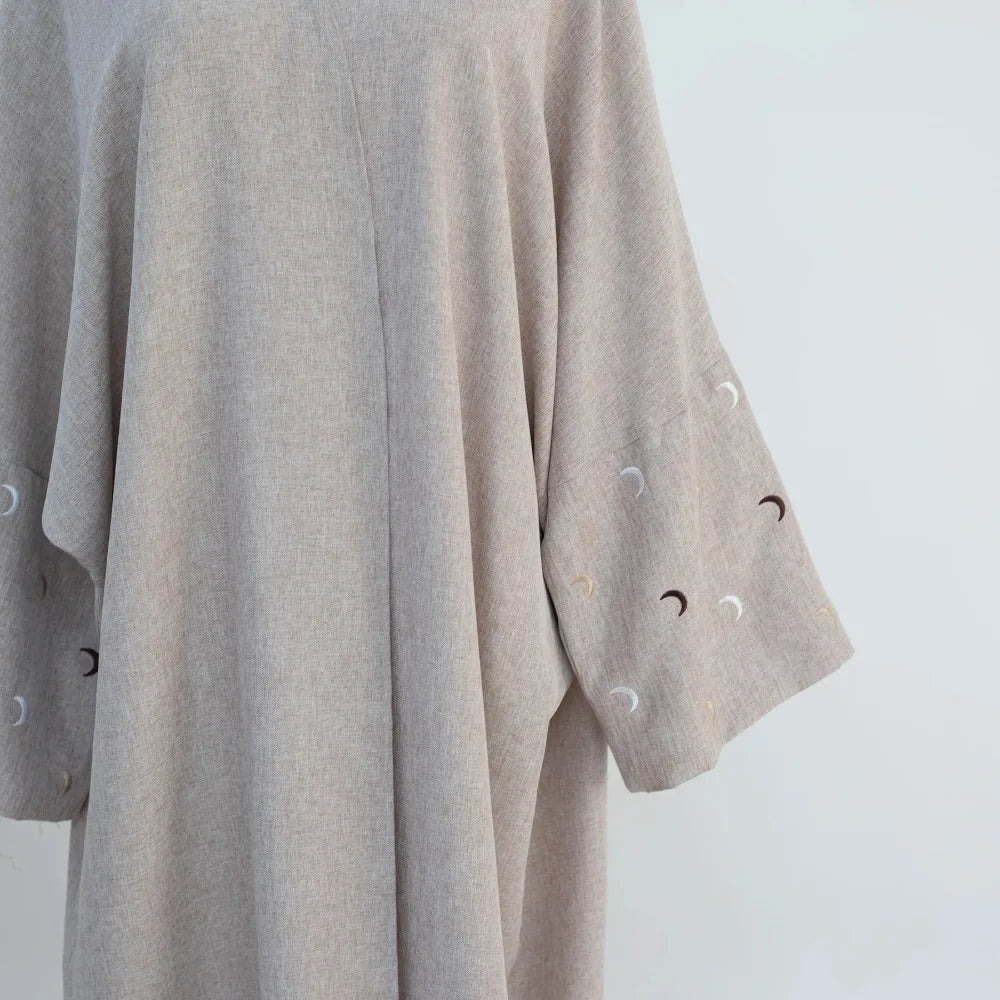 Abaya ouverte brodée de lune pour femmes: élégance et tradition
