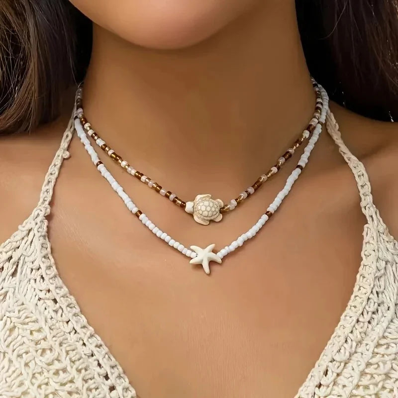 Collier perles tortue étoile de mer ras du cou vintage plage femme