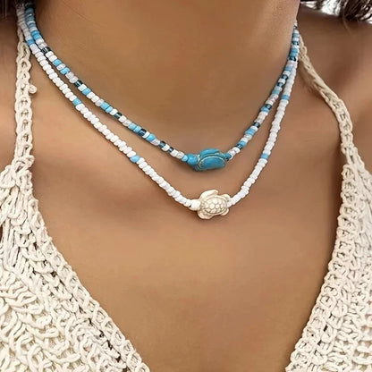 Collier perles tortue étoile de mer ras du cou vintage plage femme