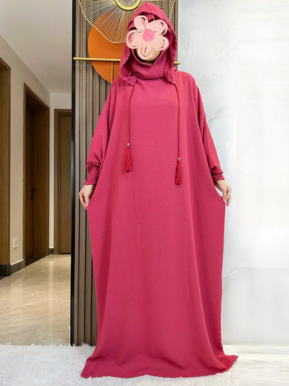 Abaya monochrome décontractée à capuche